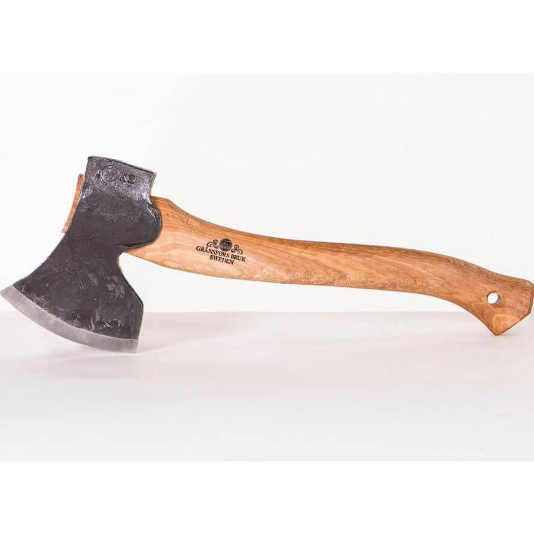 Right bevel view of the Gransfors Bruk Swedish Carving Axe with a natural wooden handle and charcoal-colored metal head against a white background.