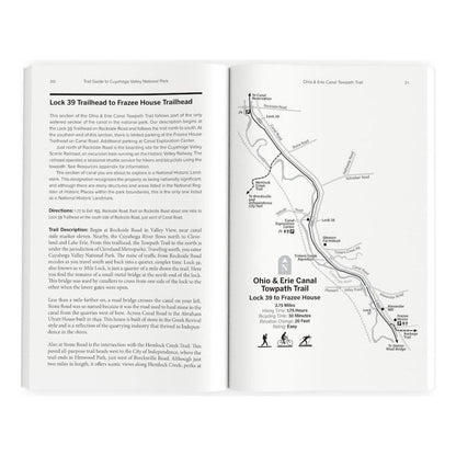 Trail Guide book for Cuyahoga Valley Nat Park open to a trail map and text page.