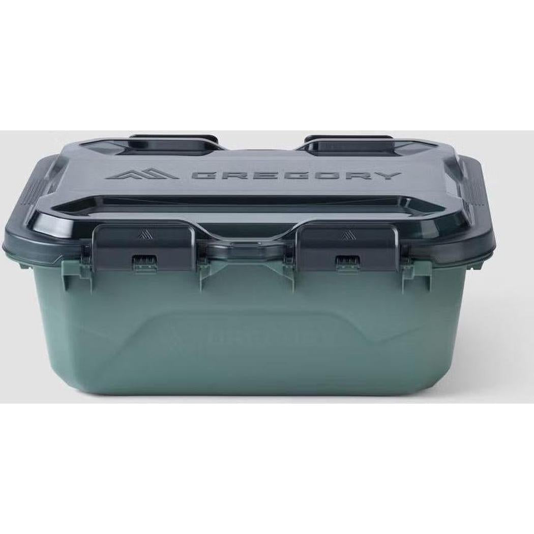 A front view of the Gregory Alpaca Gear Box 25 in Nomad Green with a dark lid and latches against a white background.