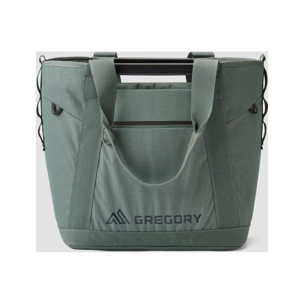 A front view of the Gregory Alpaca Utility Tote 35L in Nomad Green with the brand logo visible on the front.