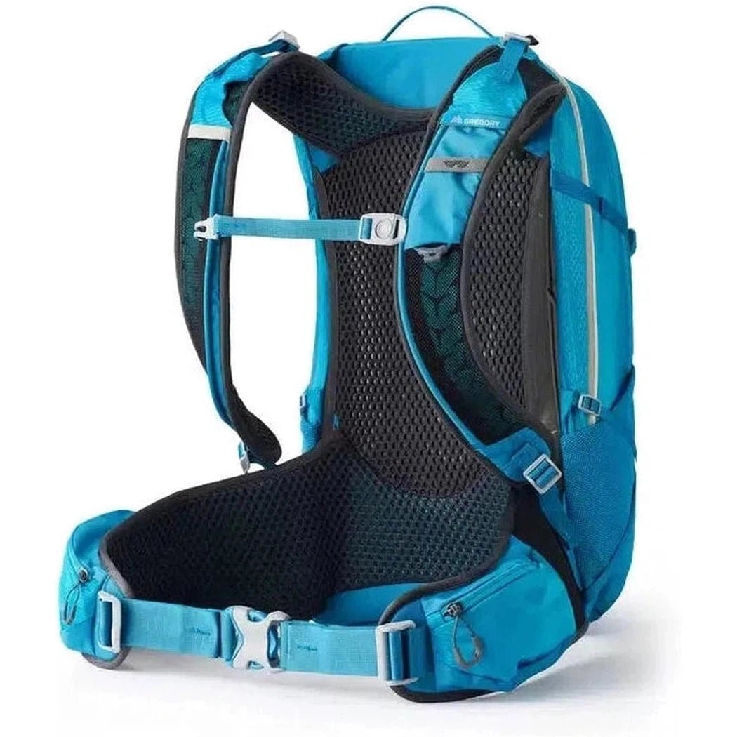 Side view of the Gregory Juno 30 H20 Plus in Laguna Blue showing the padded mesh back panel and waist belt against a white background.