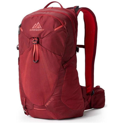 Side view of the Gregory Maya 20 Plus in Iris Red showing the front pocket and padded shoulder straps against a white background.