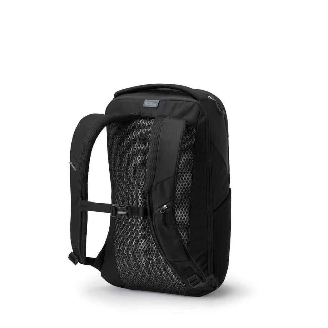 Side view of the Gregory Rhune 22 in Cabon Black showing the padded mesh back panel against a white background.
