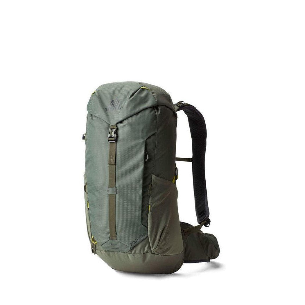 Side view of the Gregory Zulu 28 LT Plus in Forage Green showing the front compression strap and black shoulder straps against a white background.