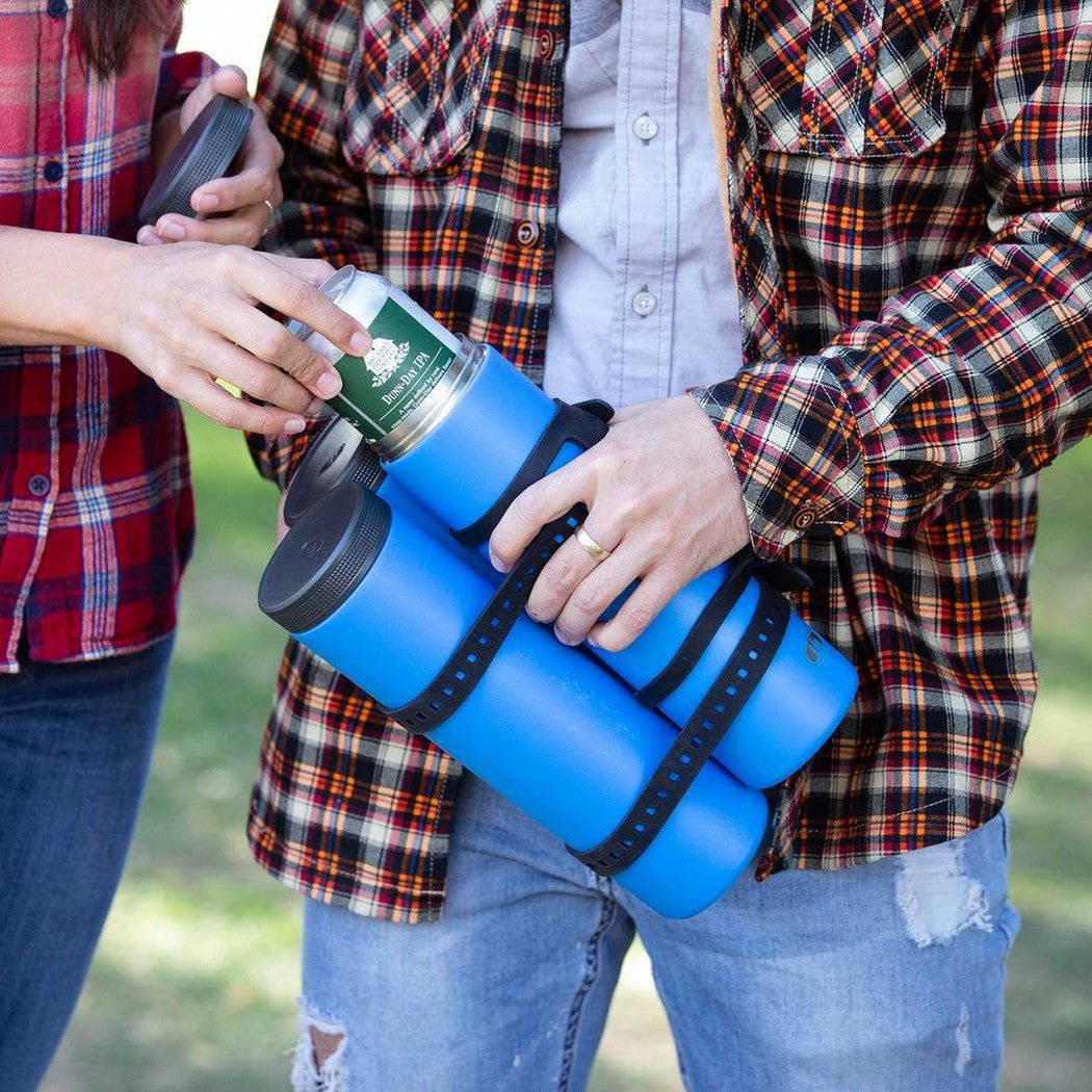 A person in a plaid shirt holds a blue GSI Outdoors 6 Can Cooler Stack with two blue water bottles, while another person in a red plaid shirt reaches for a can.