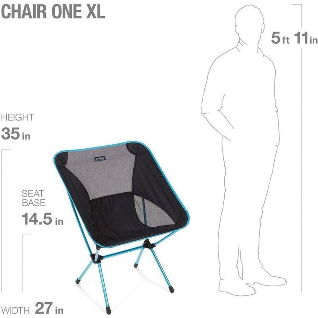 The Helinox Chair One XL in Black is shown from a front angle with its dimensions labeled, standing next to a 5ft 11in tall model.