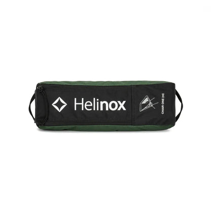 A black Helinox Chair One bag with green trim and white branding, shown from a front angle against a white background.