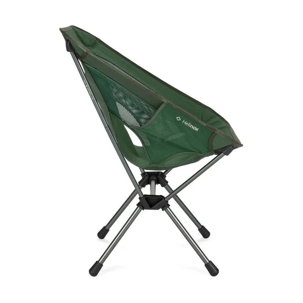 Side view of the Helinox Chair One in Black showing the mesh back and tripod base against a white background.