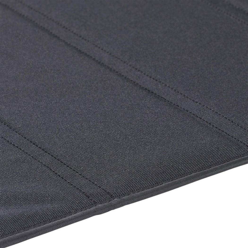 Close-up of the Helinox Table One Hard Top in Black R1 showing the stitched seams and black fabric.