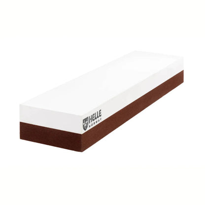 A side view of the Helle Sharpening stone L with leather holster against a white background.