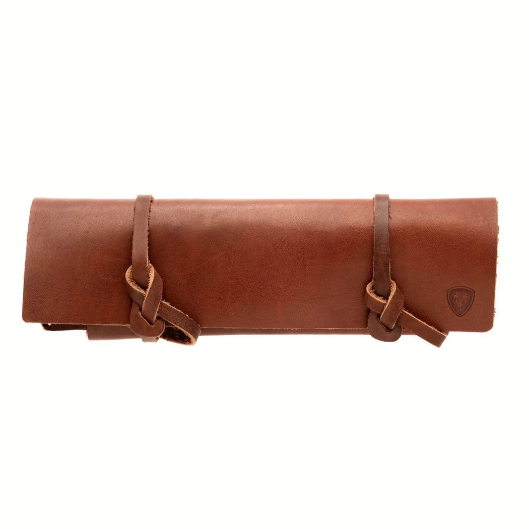 A brown Helle Sharpening stone L with leather holster laid flat against a white background.