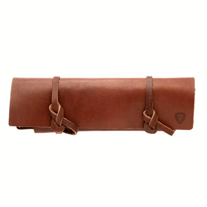 A brown Helle Sharpening stone L with leather holster laid flat against a white background.