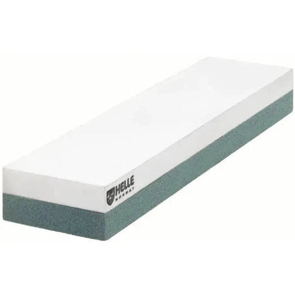 A side view of the Helle Sharpening Stone S with Leather Holster against a white background.