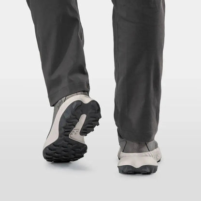 Back view of the Helly Hansen Men’s AWE Hiker DWR Shoes in Concrete/Mellow Grey showing the lugged outsole on a white background.