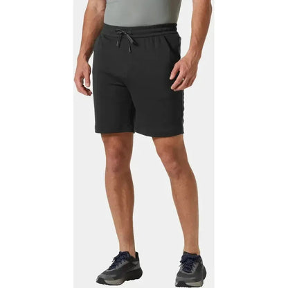 A front view of the Helly Hansen Men's LIFA Tech Lite Shorts in Black on a model wearing them against a plain white background.