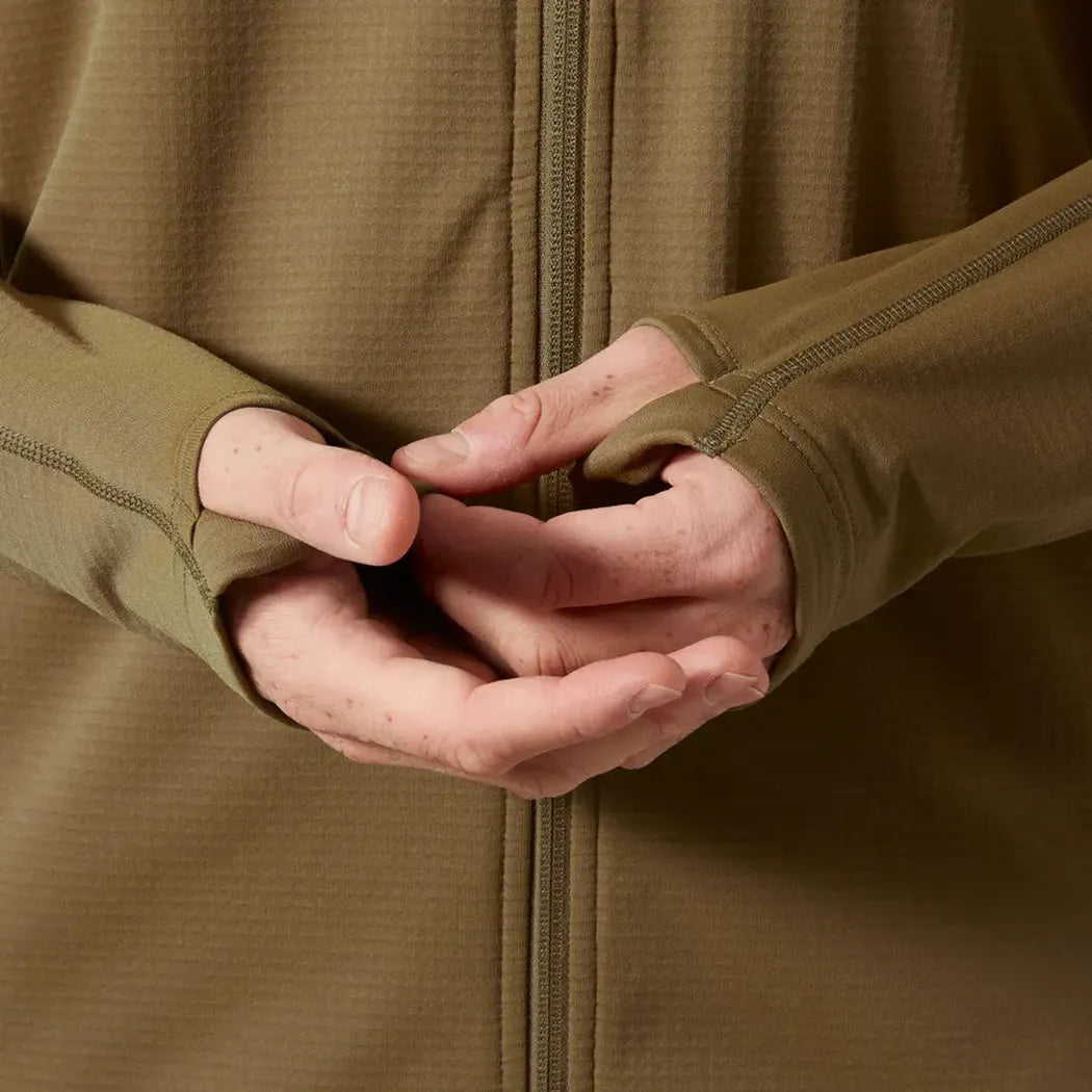A close-up of the Helly Hansen Men's Versalite Hooded Fleece Jacket in Sepia, showing the front zipper and hands clasped in front.