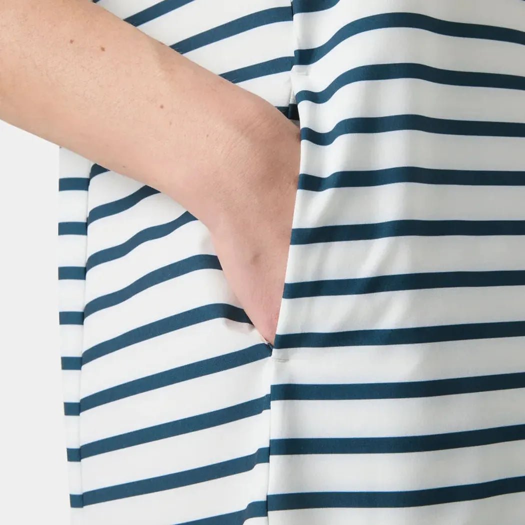 A close-up of the Helly Hansen Women's Thalia Shift Dress in White/Navy showing the pocket and striped fabric.