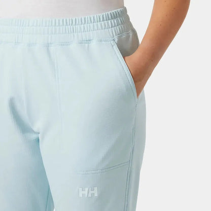 Side view of the Helly Hansen Women's Versalite Fleece Pant in Barely Blue showing the elastic waistband and pocket detail.