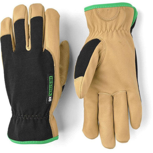 Side view of the Hestra Job Golden Kobolt gloves showing the black palm and tan leather construction against a white background.