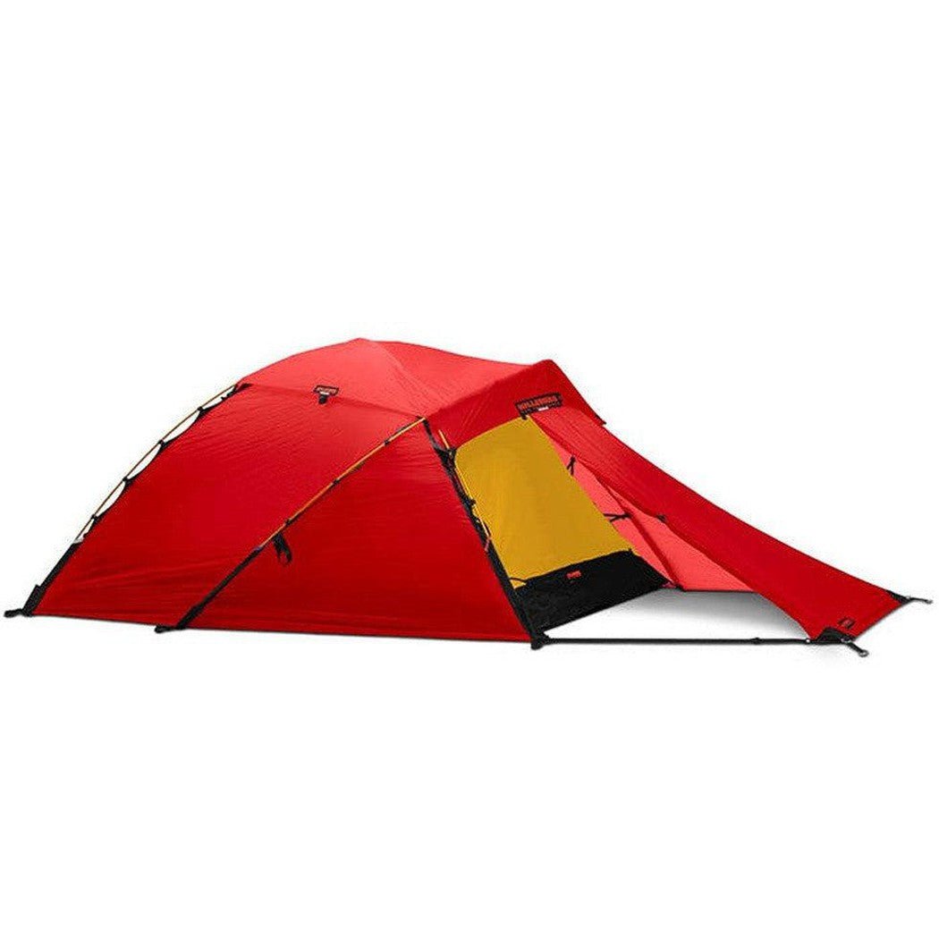 A side view of the Hilleberg Jannu in Green showing the yellow interior and black floor against a white background.
