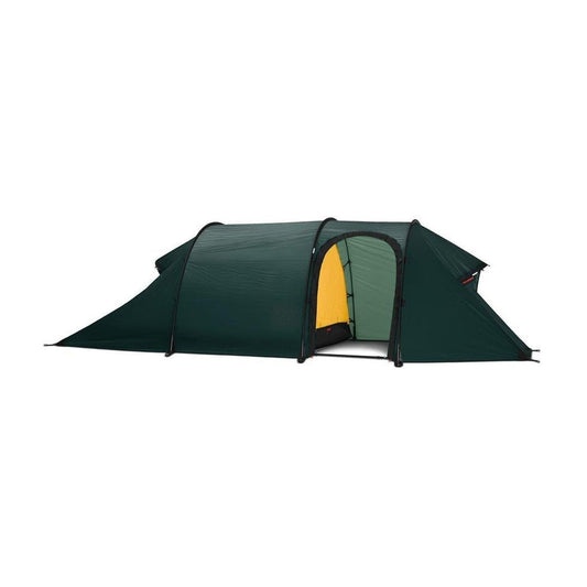 Side view of the Hilleberg Nammatj 2 GT green tent showing the entrance and a white background.
