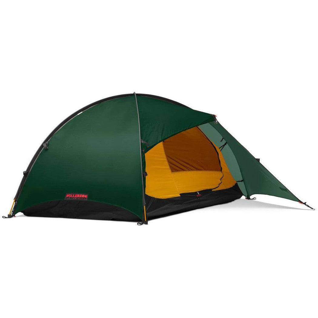 A side view of the Hilleberg Rogen 2 tent in Red showing the yellow interior and black floor against a white background.
