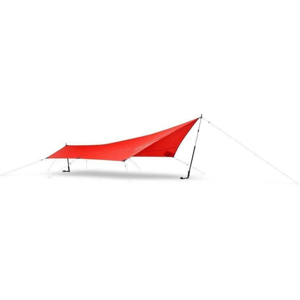 A red Hilleberg Tarp 5 is set up in a side view against a white background.