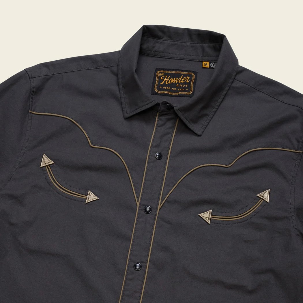 A close-up of the Howler Brothers Broncbuster Longsleeve Snapshirt in MoonlessNight showing the western-style stitching and snap buttons against a plain background.