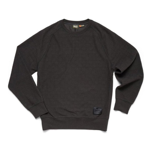 A front view of the Howler Brothers Men's Eleos Fleece Crewneck in Antique Black with a small patch on the lower left side against a white background.