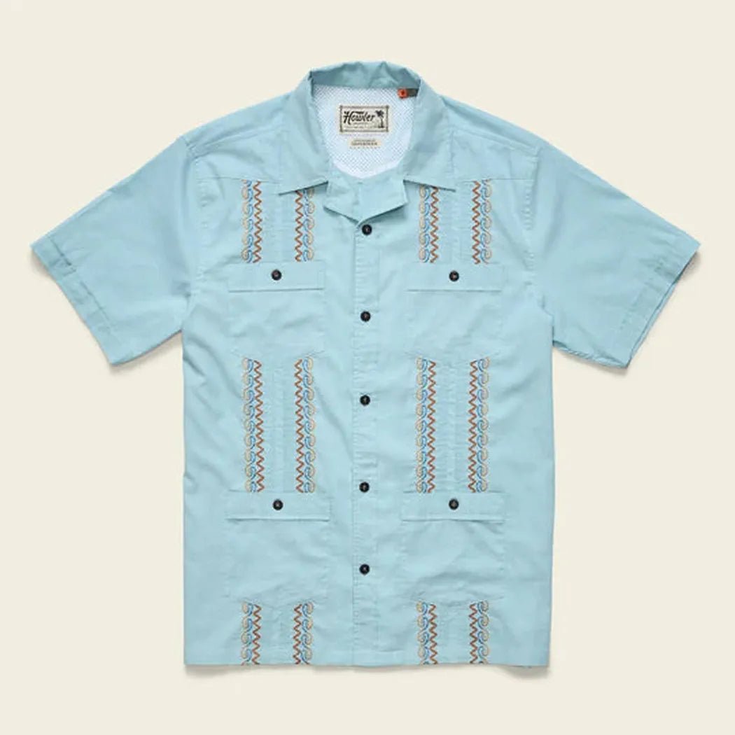 A front view of the Howler Brothers Men's Guayabera Shirt in Nile Blue showing the embroidered details and button front against a light background.