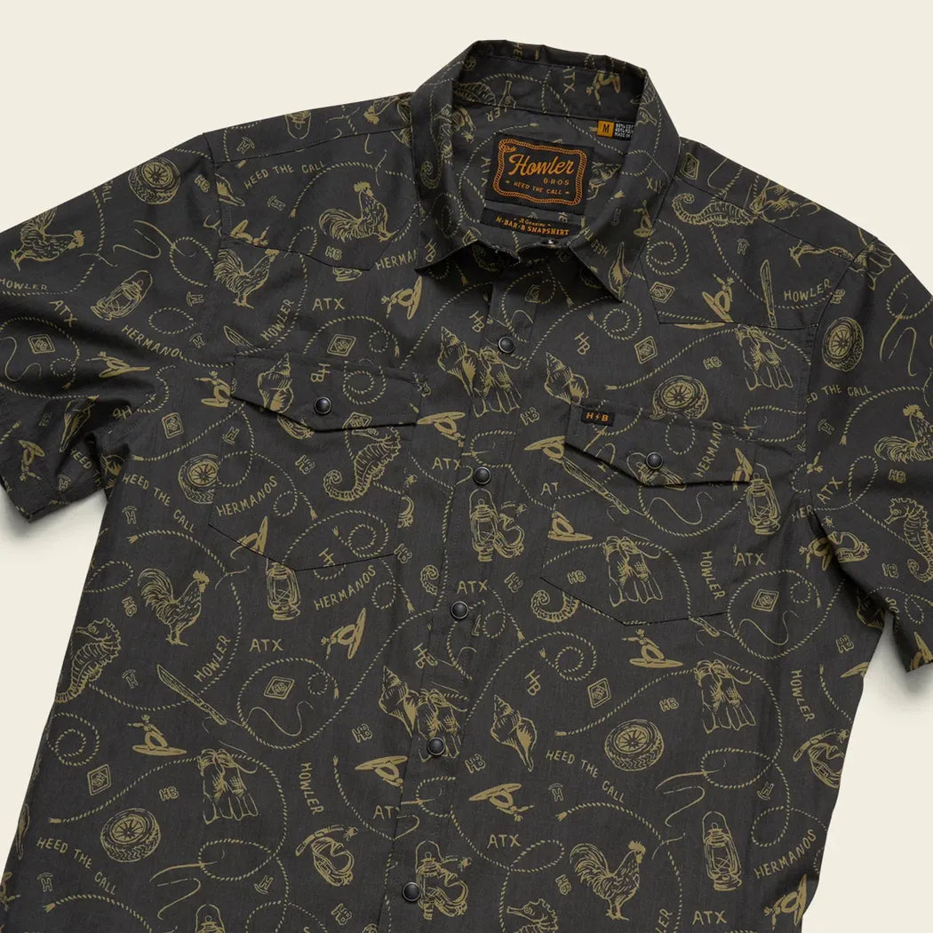 A flat lay of the Howler Brothers Men's H Bar B Snapshirt in Bouquets: Morel, showing the button-down collar and chest pockets against a neutral background.