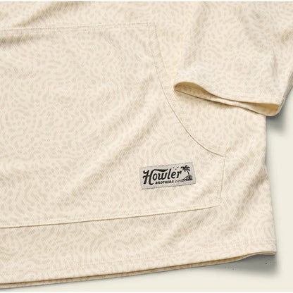 A close-up of the Howler Brothers Men's Loggerhead Hoodie in Meridians Plains showing the front pocket and logo on a light background.