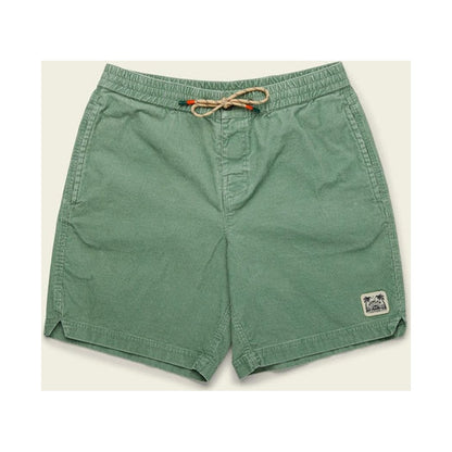 Side view of the Howler Brothers Men's Pressure Drop Cord Shorts in Lichen Green showing the drawstring waist and small logo patch on the right leg against a light background.