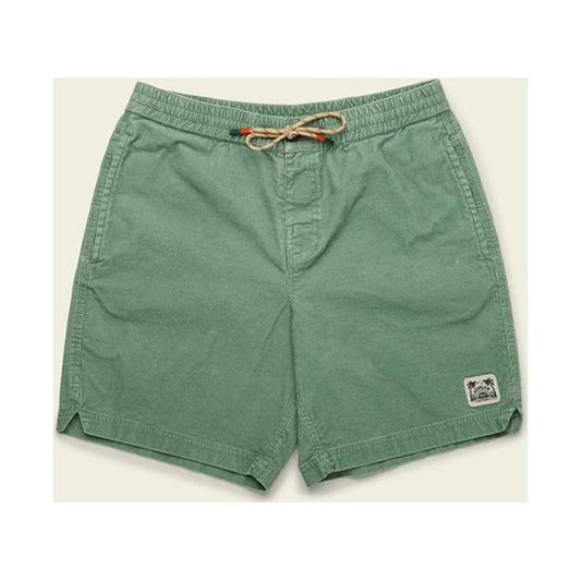 Side view of the Howler Brothers Men's Pressure Drop Cord Shorts in Lichen Green showing the drawstring waist and small logo patch on the right leg against a light background.