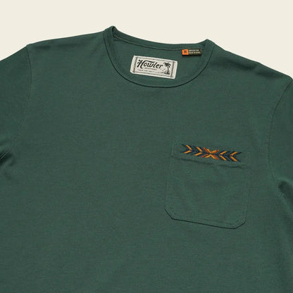 A front view of the Howler Brothers Men's Spectrum Pocket T in Bone White showing the pocket and logo tag against a plain background.