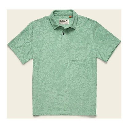 A front view of the Howler Brothers Plusherman Terry Polo in Cream showing the chest pocket and button placket against a light background.