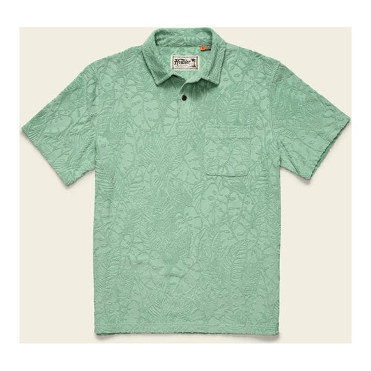 A front view of the Howler Brothers Plusherman Terry Polo in Cream showing the chest pocket and button placket against a light background.