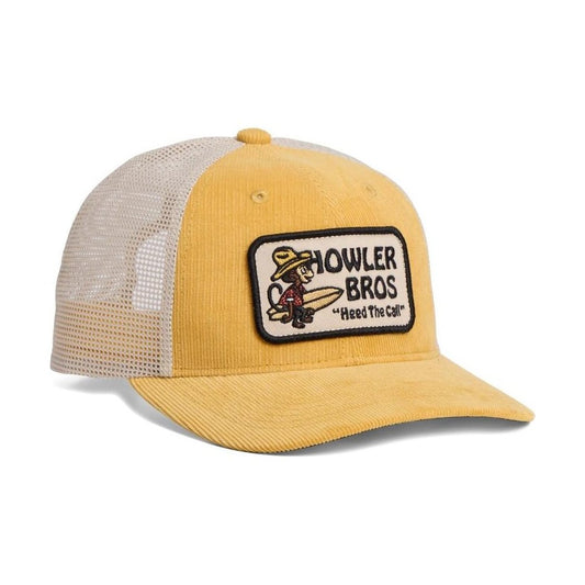 A front view of the Howler Brothers Standard Hat in El Sol Brown with a mesh back and a patch showing a surfer.