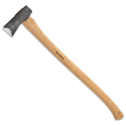 A natural, complete sentence describing the photo is: "Side view of the Hults Bruk Kvillinge Splitting Axe with a light wooden handle and a dark charcoal-colored axe head against a white background.