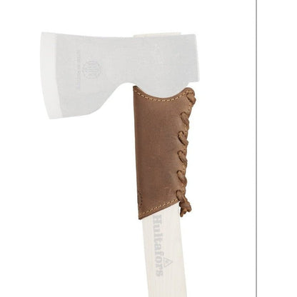 A close-up of the Hults Bruk Overstrike Guard in brown leather with lacing, against a white background.