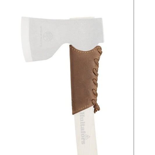 A close-up of the Hults Bruk Overstrike Guard in brown leather with lacing, against a white background.