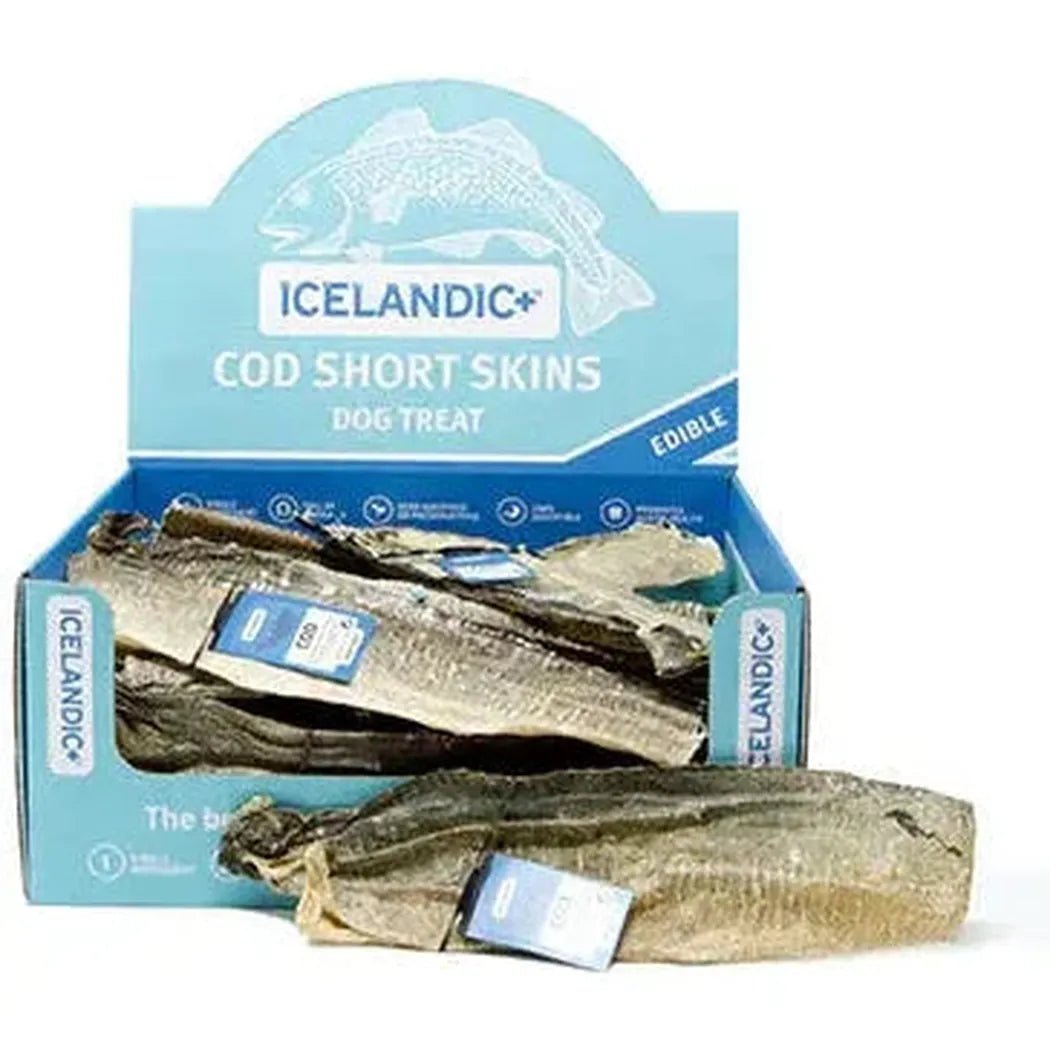A blue display box of Icelandic+ cod short skins dog treats with a few chews visible in front of it.