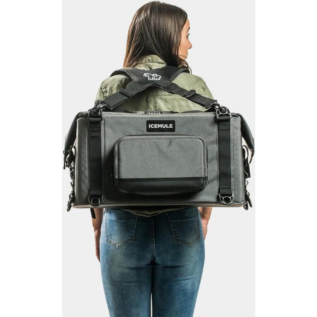Back view of the IceMule Coolers Traveler 35L in Snow Grey on a model wearing it against a white background.