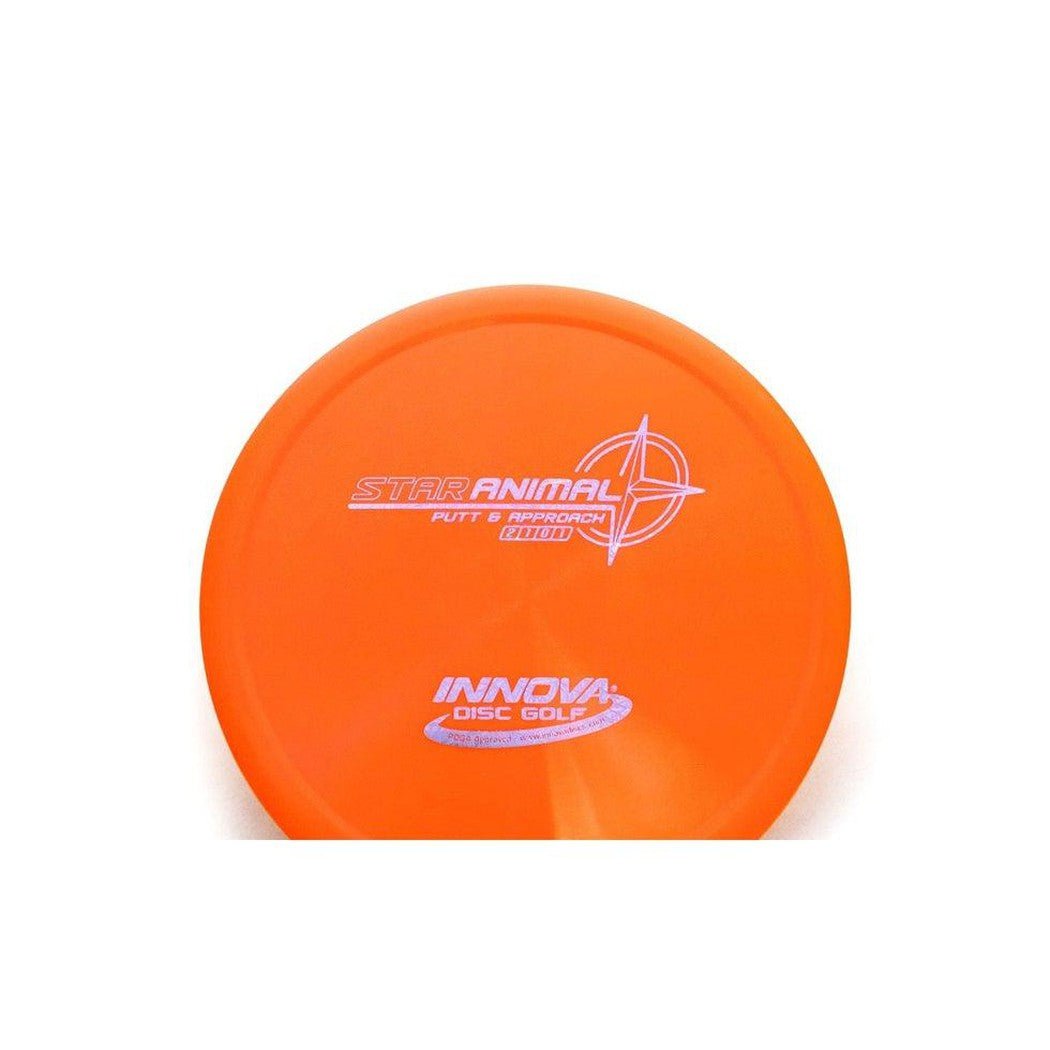 An orange Innova Disc Golf Star Animal putt and approach disc shown from the front against a white background.
