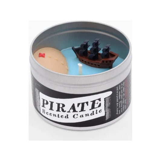A pirate themed scented candle in a tin with a ship and island scene inside.