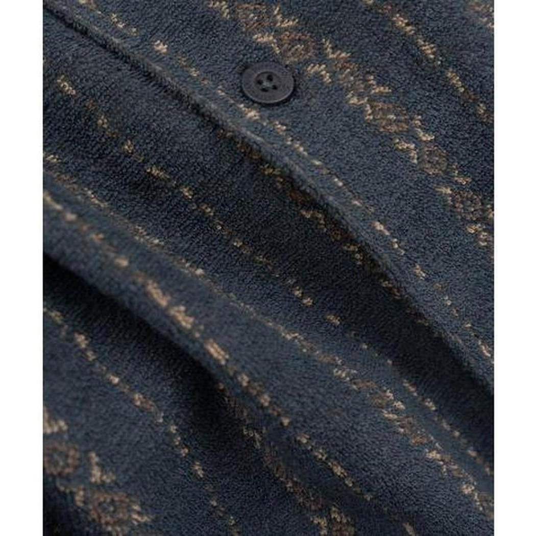 A close-up of the Jetty Men's Asbury Knit Button Down in Navy showing the button and knit fabric texture.