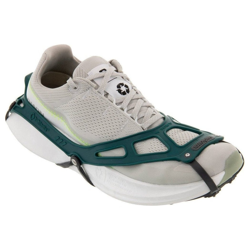 A side view of the Kahtoola NANOspikes Footwear Traction in Black on a white background.