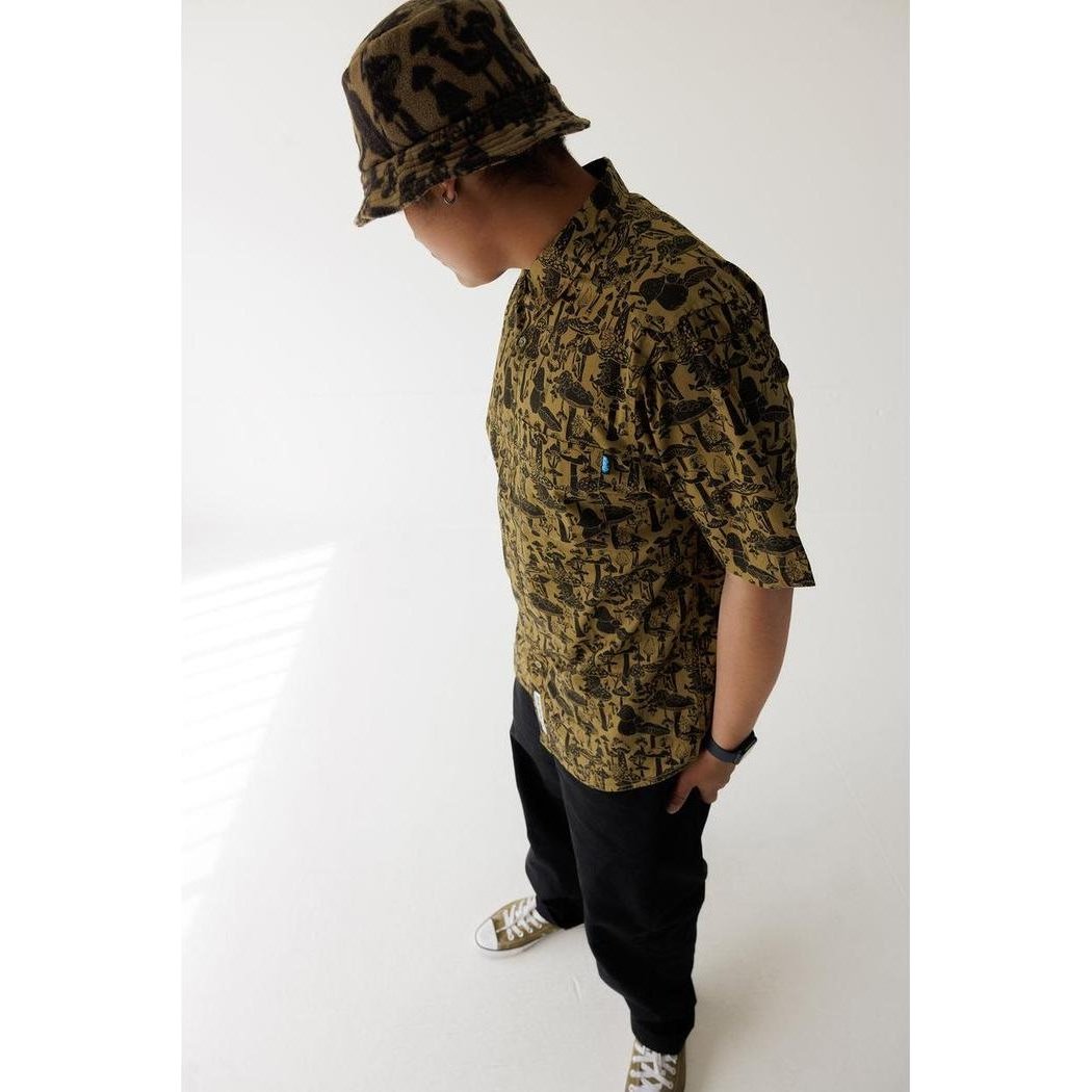 A model wearing the Kavu Men's Festaruski in Naturally Lost At Sea stands against a white background.