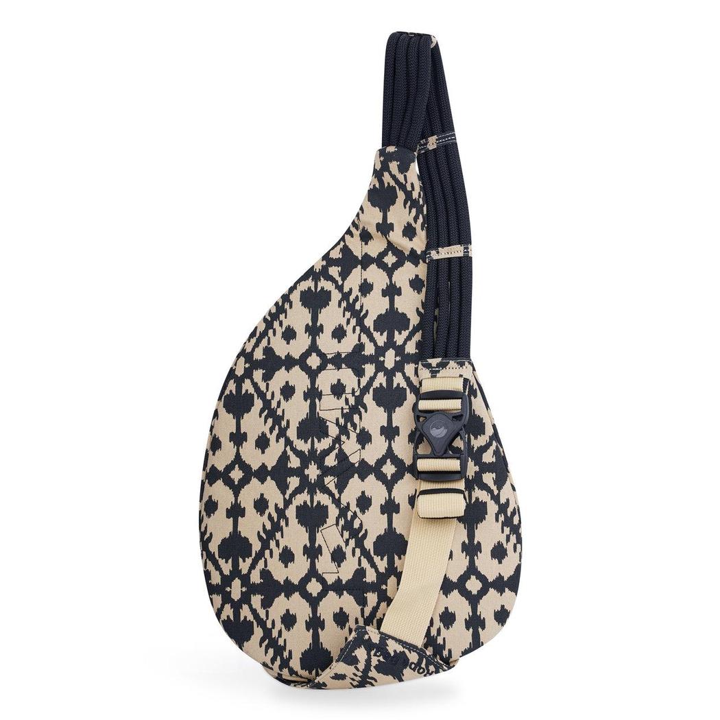 Side view of the Kavu Rope Bag in Camp Vides showing the adjustable strap and black rope handle against a white background.