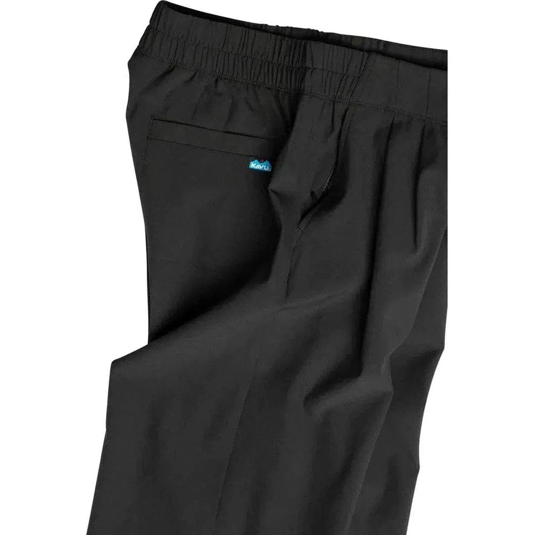 Side view of the Kavu Women's La Ticia in Black showing the elastic waistband and back pocket with a blue tag.